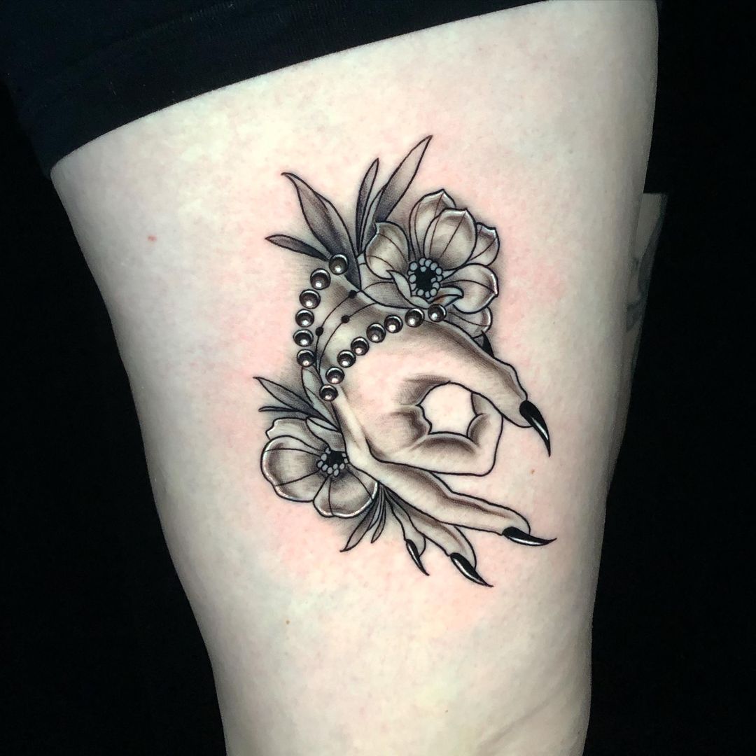 Fine-line anatomical heart and flowers tattoo by Ben Spear at Inkcredible Tattoo Studio in Virginia Beach