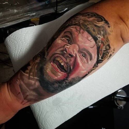 Expressive color portrait tattoo by Mattlock Lopes at Inkcredible Tattoo