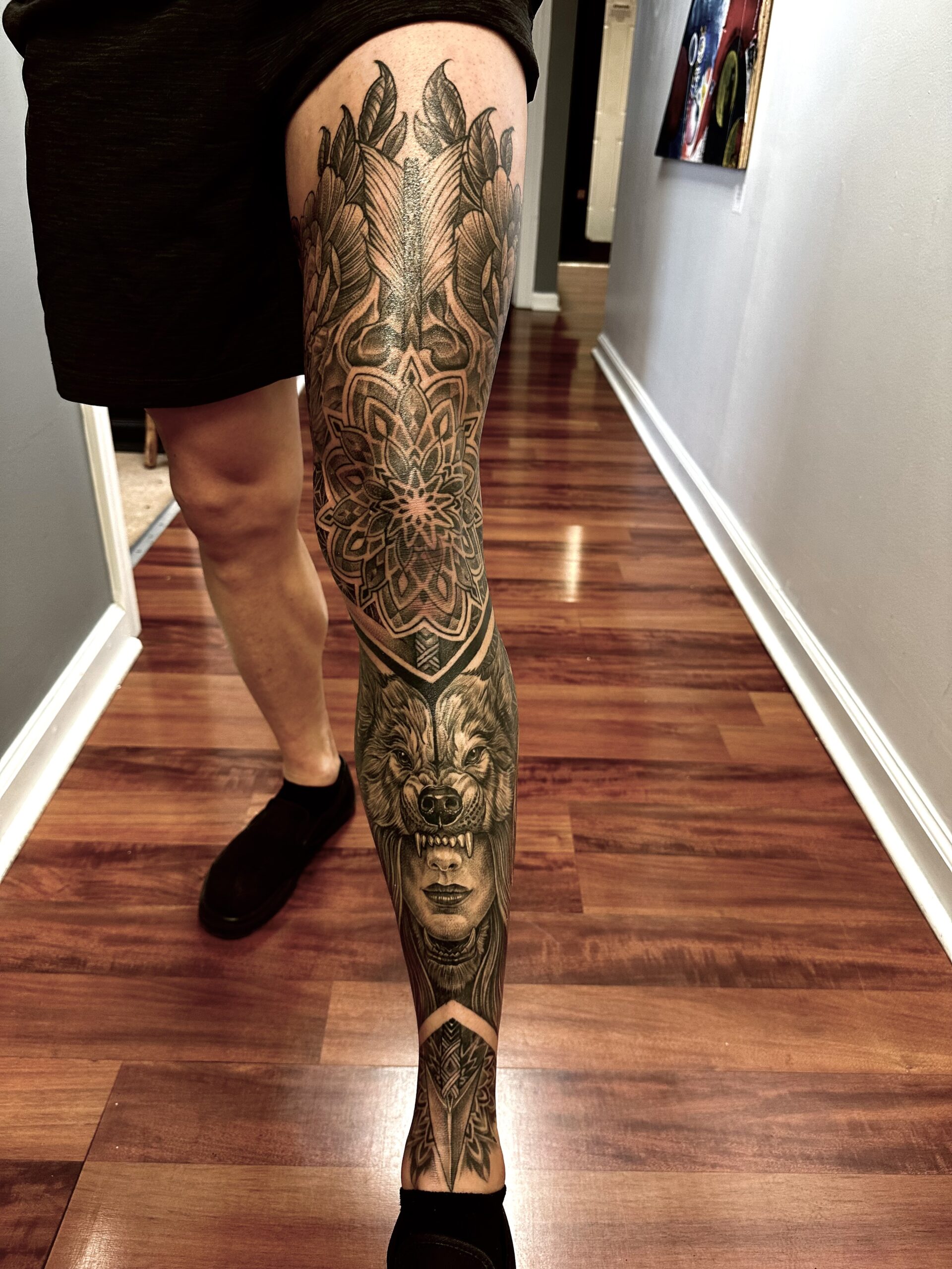 Ornamental floral leg sleeve tattoo by Chipi Camposeco at Inkcredible Tattoo in Virginia Beach