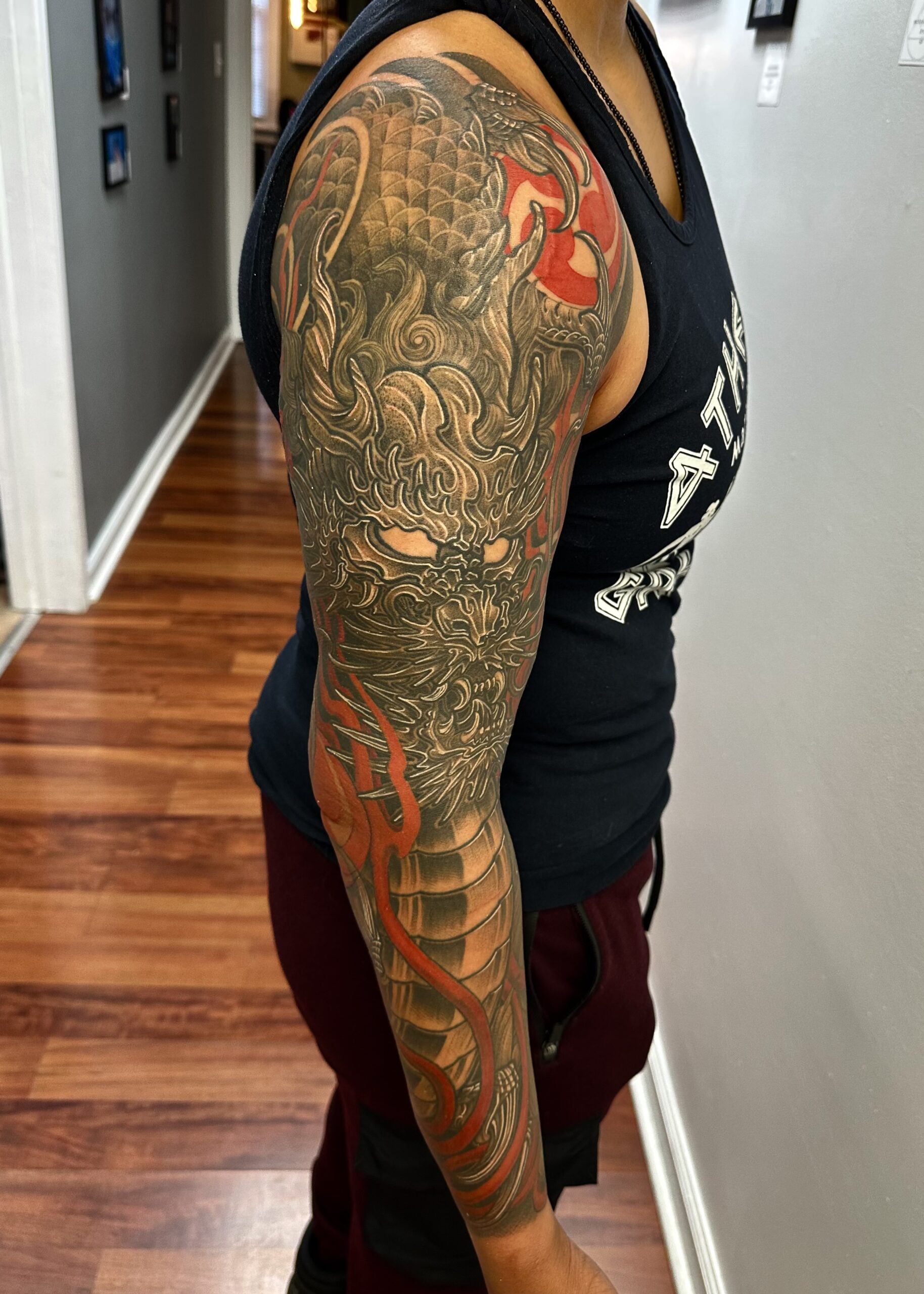Japanese dragon sleeve tattoo by Chipi Camposeco at Inkcredible Tattoo in Virginia Beach