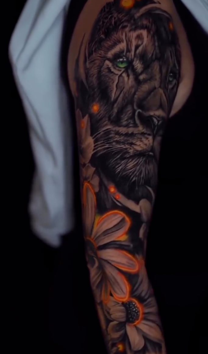 Lion and sunflower sleeve tattoo by Dorse Taylor at Inkcredible Tattoo in Virginia Beach