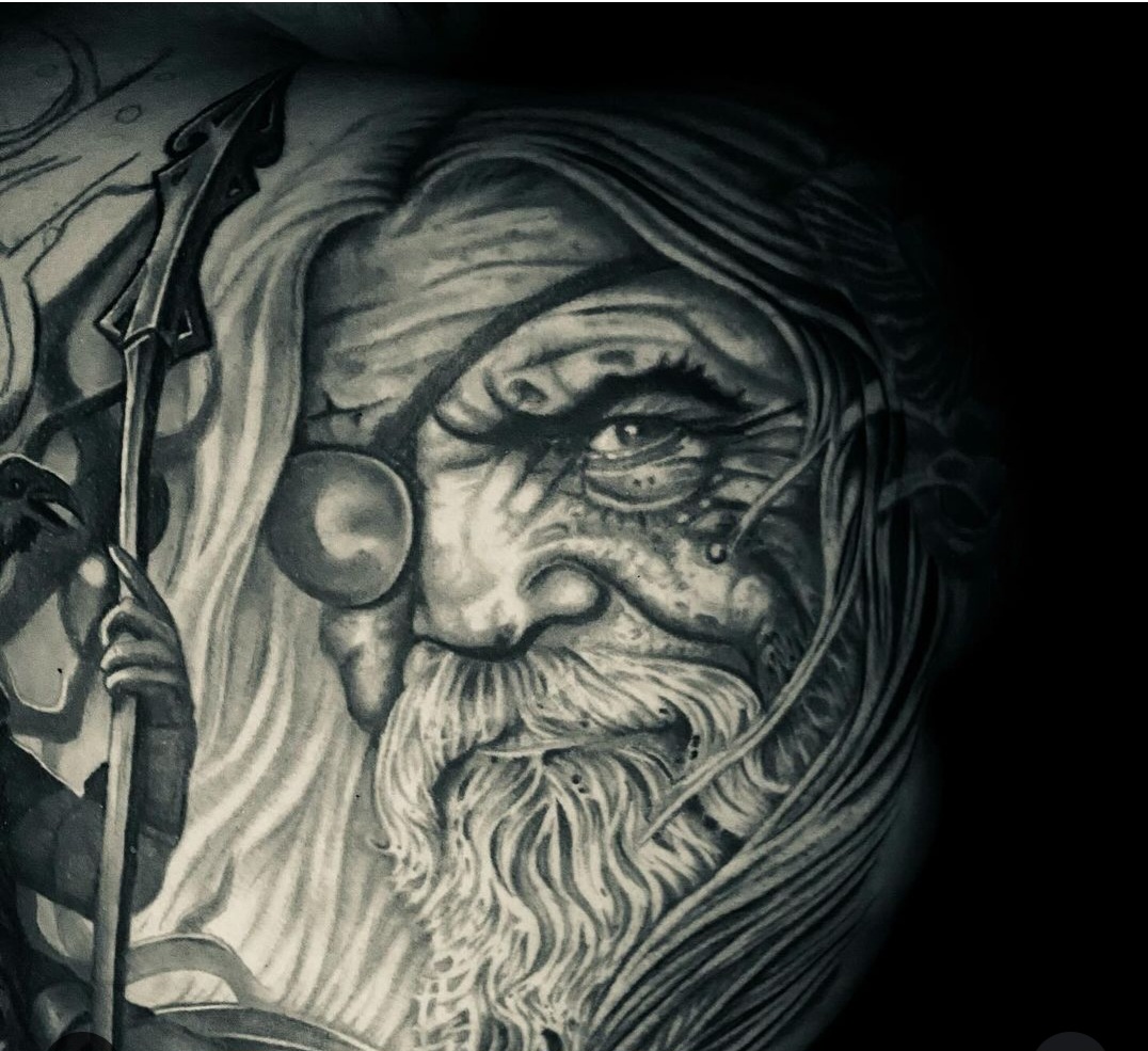Custom black-and-grey tattoo by Burke Long