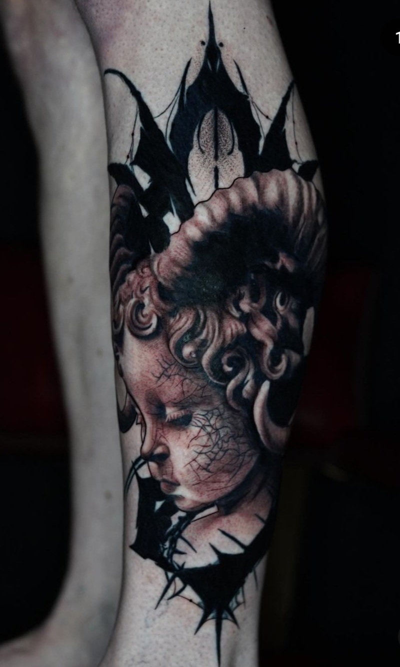 Surreal classical portrait tattoo by Ben Spear at Inkcredible Tattoo