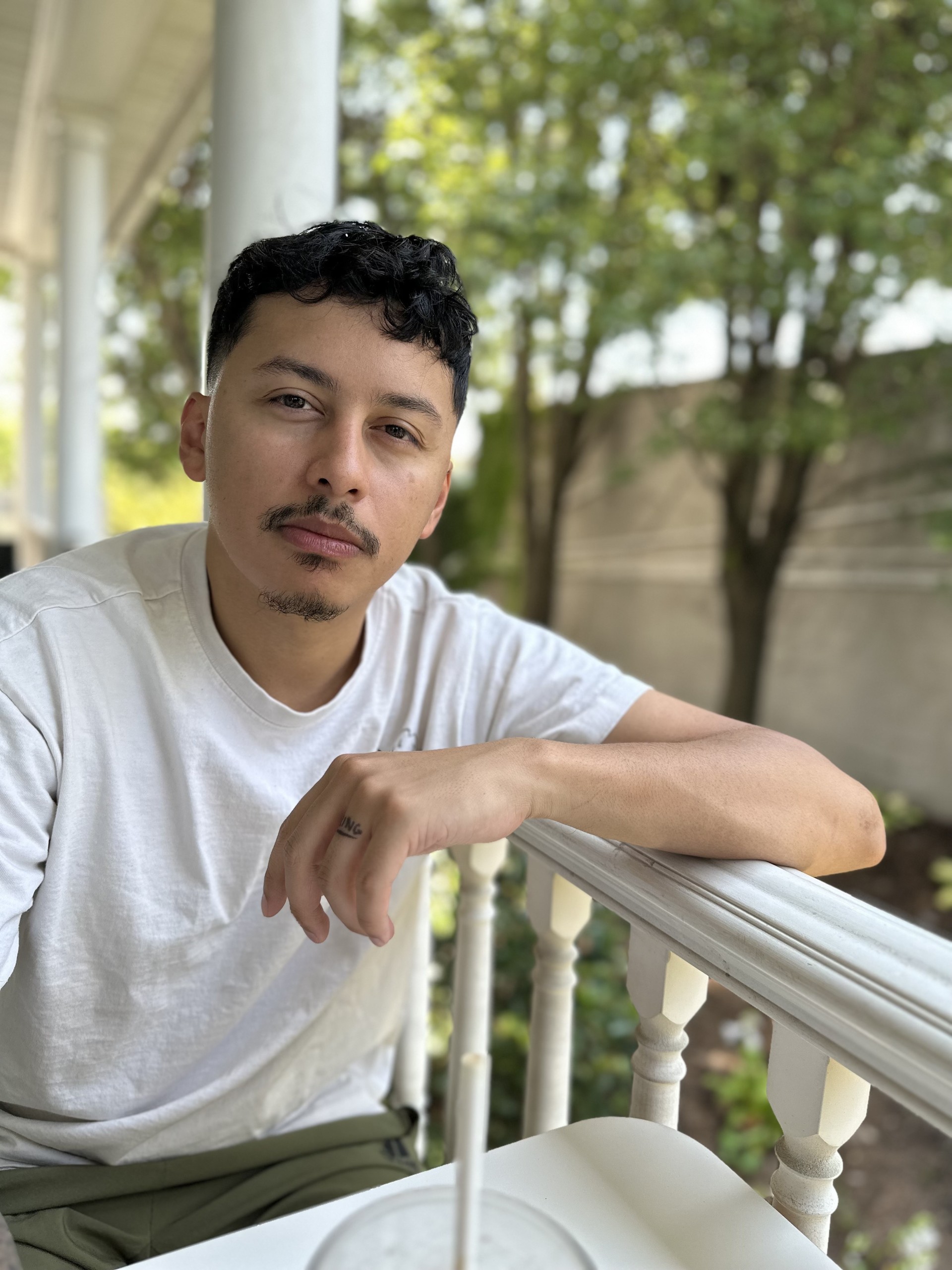 Portrait of Chipi Camposeco, Japanese and freehand tattoo artist at Inkcredible Tattoo in Virginia Beach